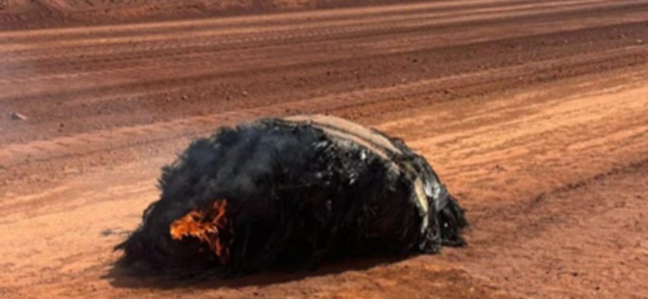 Charred piece of secretive Chinese rocket found still smoldering in the Australian outback