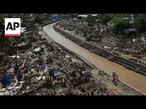 vehicles-float-down-street-as-deadly-typhoon-kalmaegi-causes-flash-floods-in-the-philippines