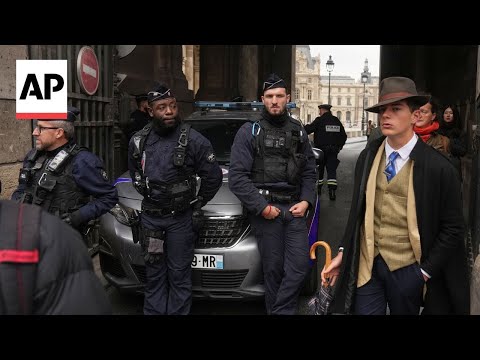 french-teen-behind-louvre-heist-‘fedora-man’-photo-embraces-his-mystery-moment