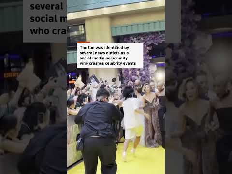 fan-rushes-at-ariana-grande-in-singapore