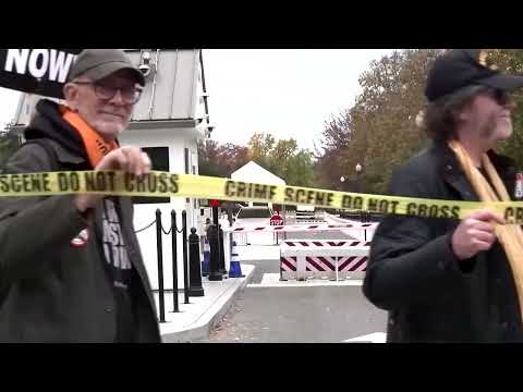 protesters-wrap-‘crime-scene’-tape-around-white-house-perimeter-|-reuters