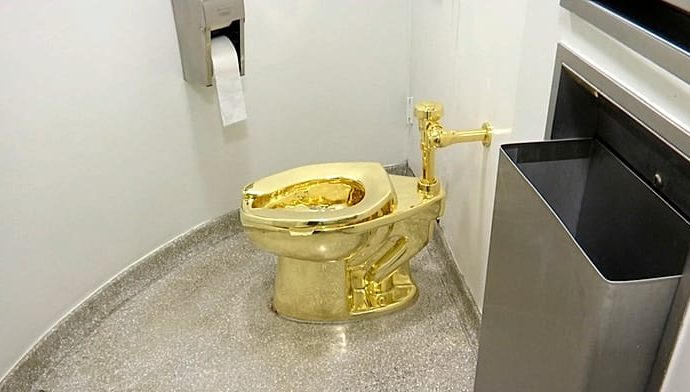 solid-gold-toilet-sells-for-$12-million-at-auction