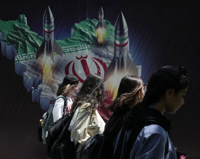 in-defiance-of-the-law,-iranian-women-shed-the-hijab