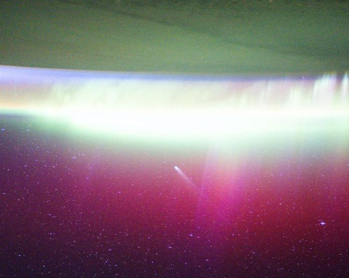 ISS astronauts see comet Lemmon ‘absorbed’ by aurora | Space photo of the day for Nov. 20, 2025