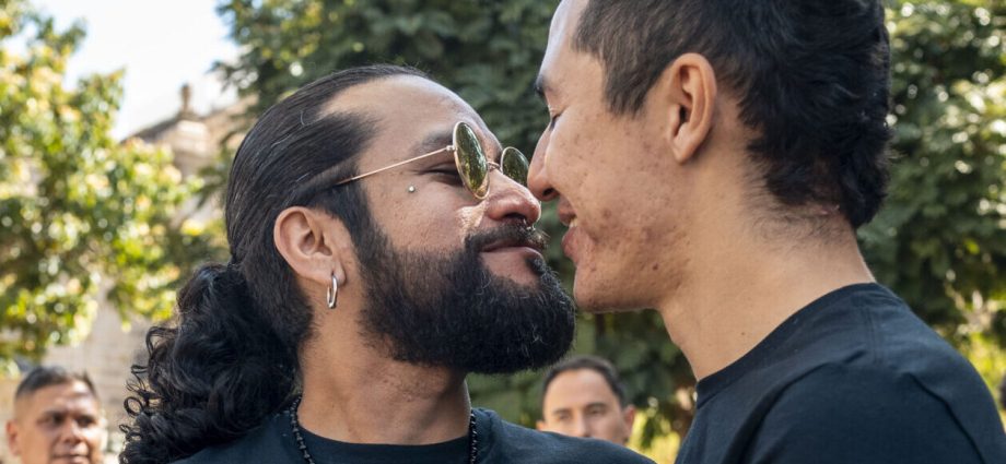 at-the-border,-queer-joy-becomes-protest:-hiv-activists-defy-stigma-on-world-aids-day-eve