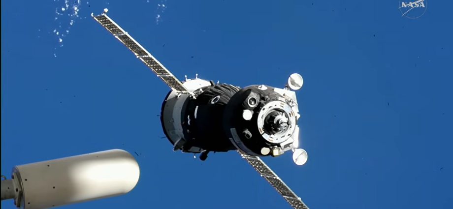 three-new-crew-members-aboard-soyuz-dock-to-station