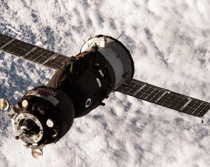 three-crewmates-aboard-soyuz-approaching-station-for-docking