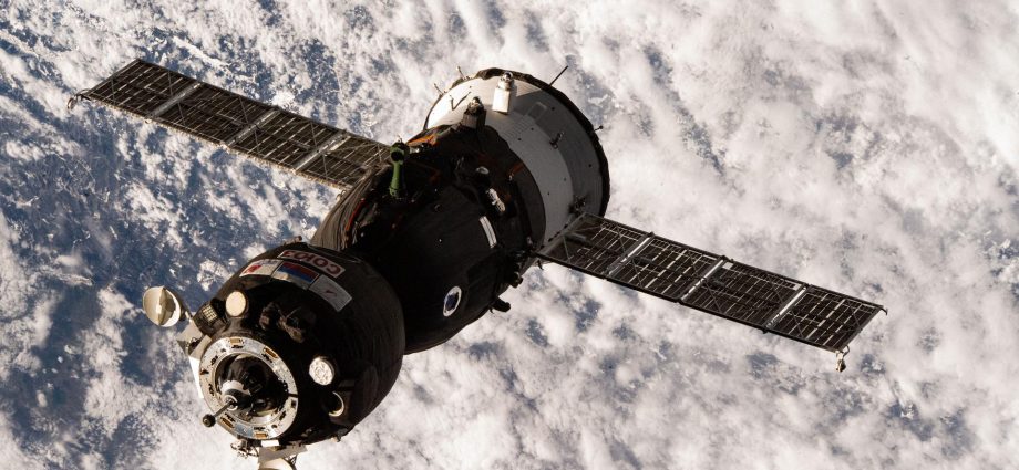 three-crewmates-aboard-soyuz-approaching-station-for-docking