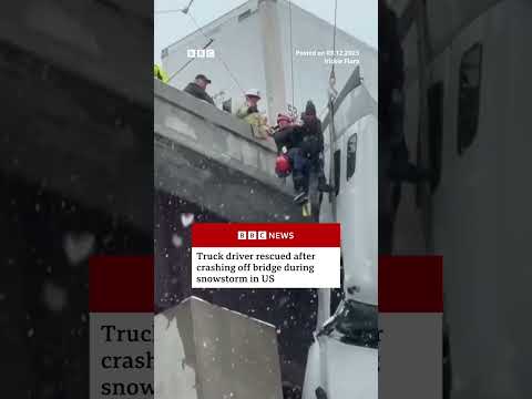 driver-rescued-after-truck-crashes-off-bridge-in-west-virginia-during-snowstorm.-#bbcnews