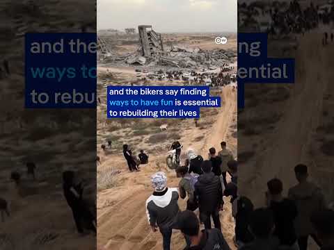 dozens-of-bikers-are-back-on-gaza’s-sand-dunes,-bringing-back-a-race-halted-by-the-war-|-dw-news