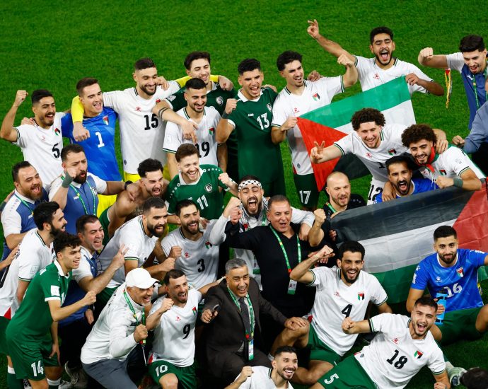 gritty-palestine-enter-arab-cup-quarters-as-favourites-qatar-crash-out