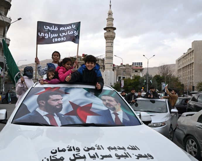 with-flags-and-fireworks,-syrians-celebrate-one-year-since-fall-of-al-assad