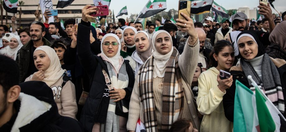 ‘i-belong-in-my-own-country’:-syrians-celebrate-a-year-after-al-assad