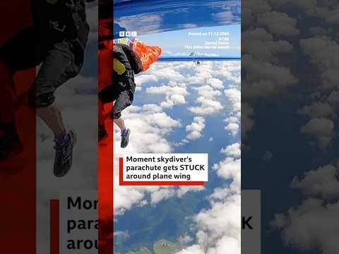 skydiver’s-parachute-gets-stuck-on-plane-wing.-#skydiving-#bbcnews