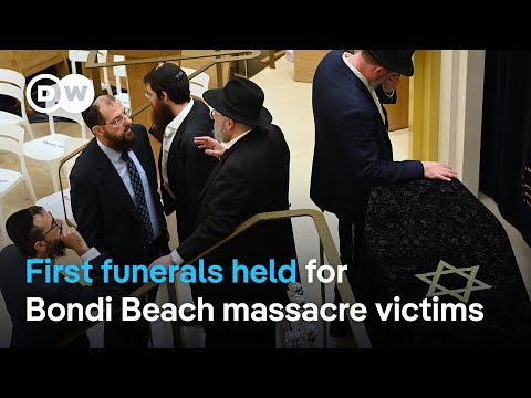 suspect-charged-as-first-bondi-beach-attack-victim-buried-|-dw-news