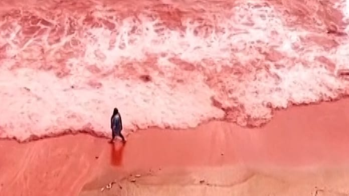 heavy-rain-turns-iran’s-hormuz-island-beach-deep-red