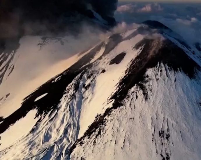aerial-video-captures-eruption-of-snowy-mount-etna