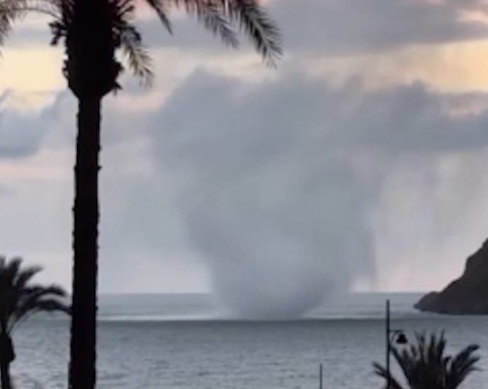 waterspout-sends-debris-skyward-off-spanish-coast