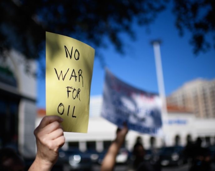 woman-arrested-on-camera-for-protesting-the-traitor’s-invasion-of-venezuela