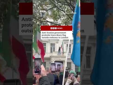 anti-iranian-government-protester-tears-down-flag-outside-embassy-in-london.-#iran-#london-#bbcnews