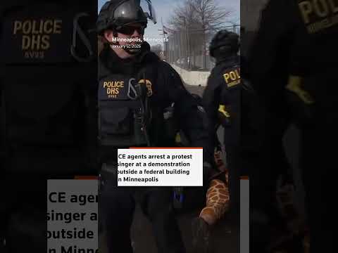 warning:-strong-language-–-ice-agents-arrest-protest-singer-in-tense-minneapolis-standoff-|-reuters