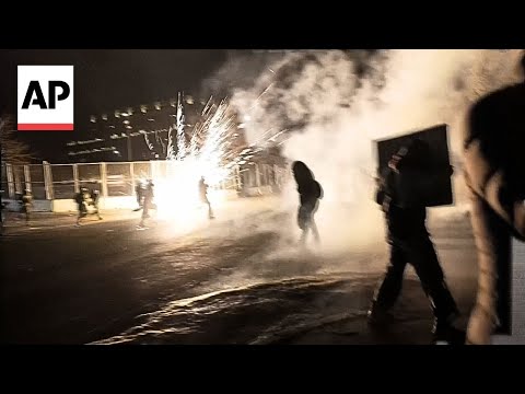 federal-agents-toss-flashbangs-toward-protestors-in-minneapolis