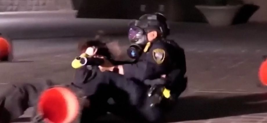 video-shows-moment-anti-ice-protester-is-shot-in-face-with-projectile