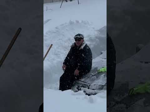 massive-snowfall-buries-cars,-blocks-doorways-in-russia