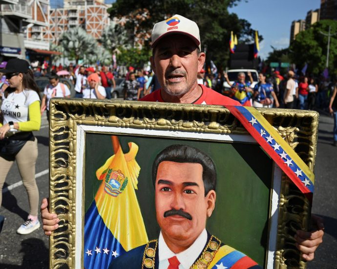 thousands-march-in-venezuela-to-demand-us-frees-president-maduro,-wife