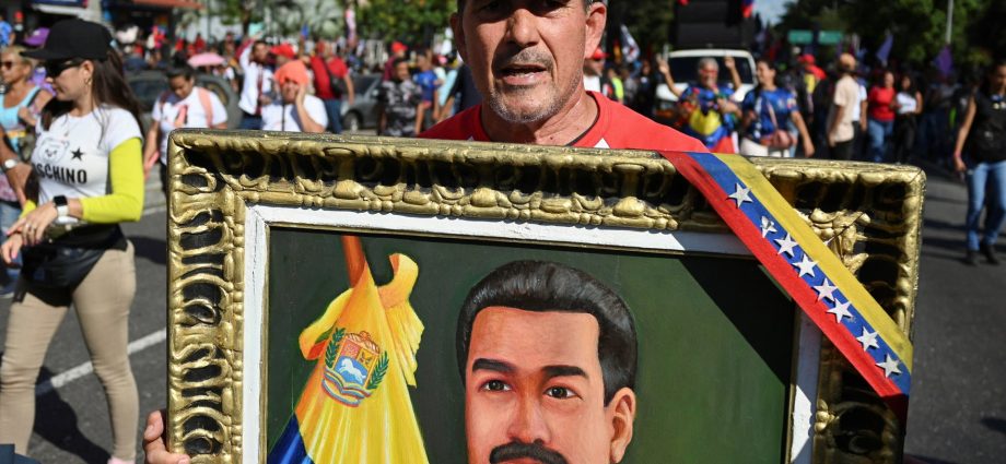 thousands-march-in-venezuela-to-demand-us-frees-president-maduro,-wife