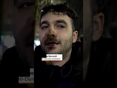 flares-burn-as-protesters-rally-against-olympics