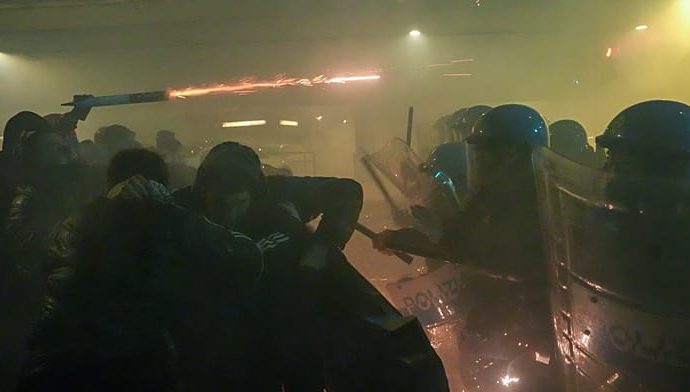 italian-police-fire-tear-gas-as-protesters-clash-near-winter-olympics-venue