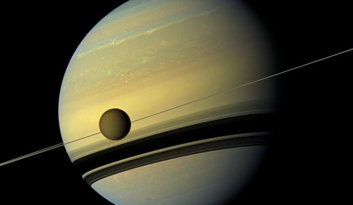 Saturn’s Ring System, Hyperion and Titan May Have Originated in Collision of Two Proto-Moons