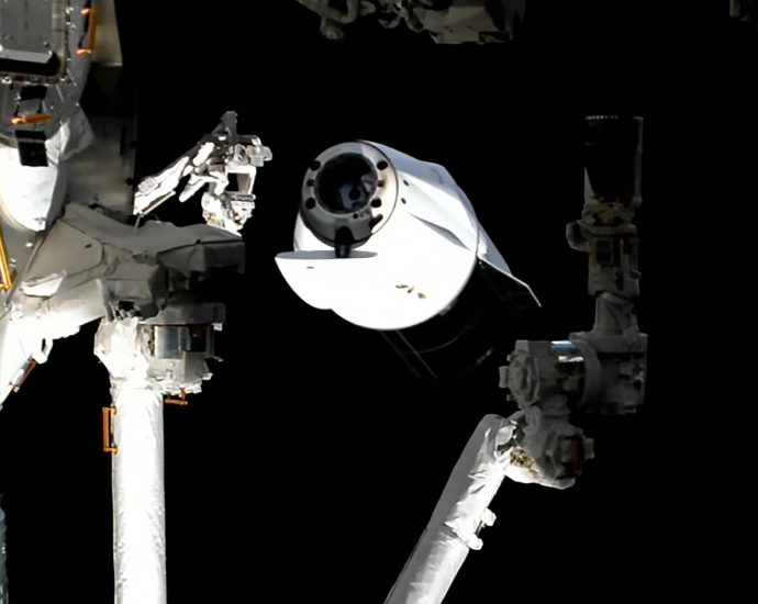 science-packed-dragon-departs-station,-heads-for-splashdown