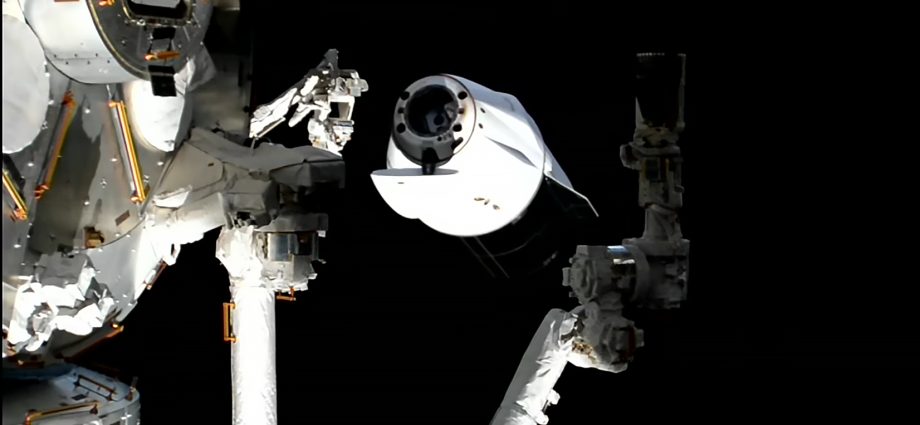 science-packed-dragon-departs-station,-heads-for-splashdown