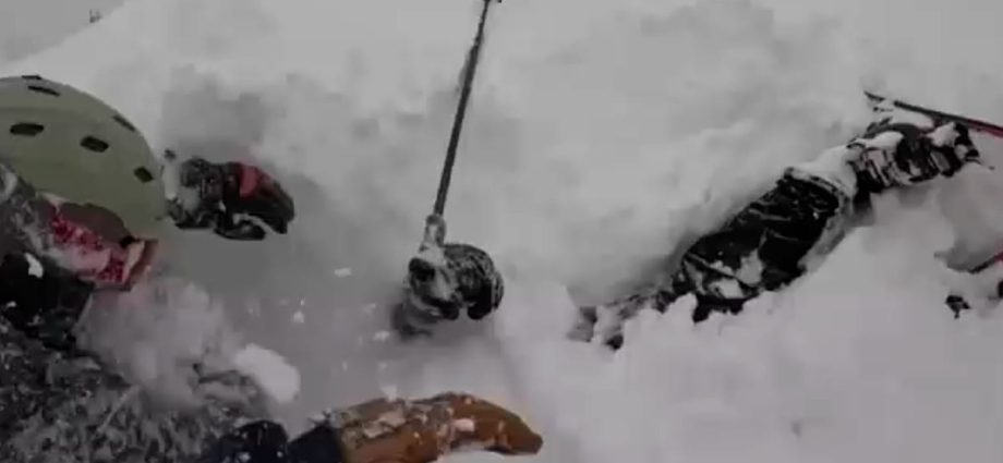 dramatic-rescue:-skier-pulled-alive-from-deep-snow-in-california