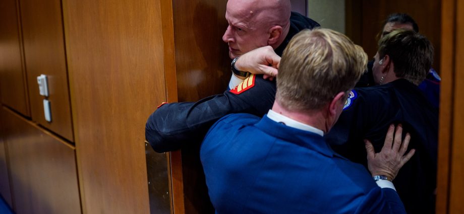 “unhinged”:-sen.-sheehy-accused-of-breaking-iran-war-protestor’s-arm