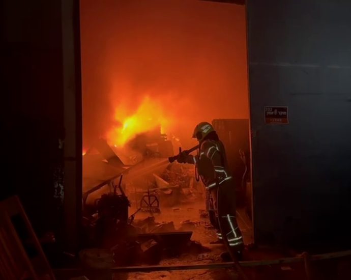 suspected-iranian-missile-debris-ignites-fires-in-central-israel