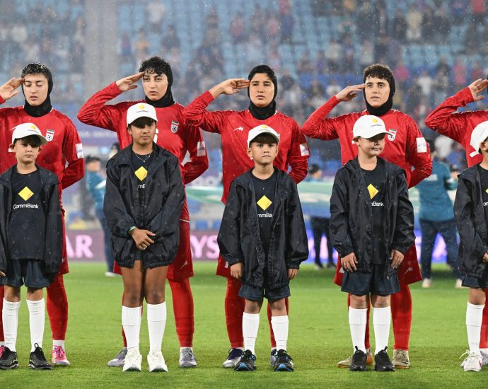 iran-women’s-football-team-sing-anthem-amid-safety-concerns-during-war