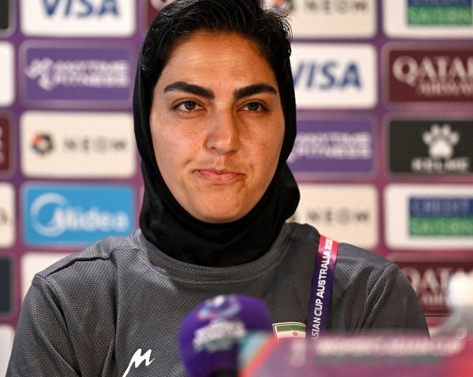 iranian-soccer-captain-to-return-to-iran,-withdraws-bid-for-asylum