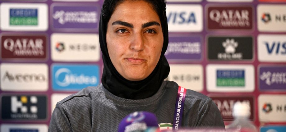 iranian-soccer-captain-to-return-to-iran,-withdraws-bid-for-asylum