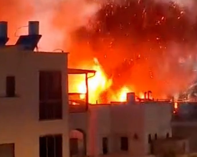 building-burns-in-israel-after-rocket-attack-from-lebanon