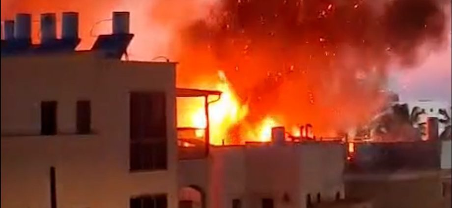 building-burns-in-israel-after-rocket-attack-from-lebanon