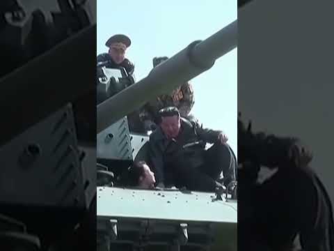 north-korea’s-kim-rides-tank-with-daughter-during-military-drills