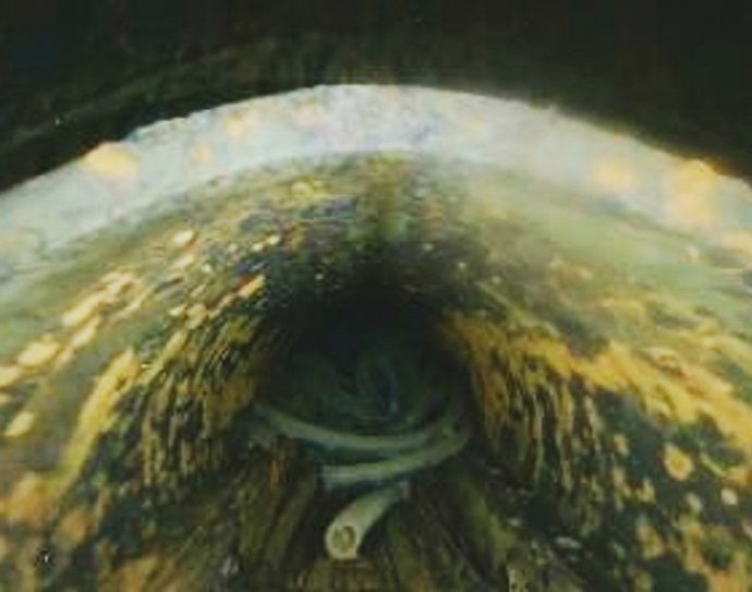 drone-video-from-inside-a-fukushima-reactor-shows-a-hole-in-pressure-vessel,-likely-fuel-debris