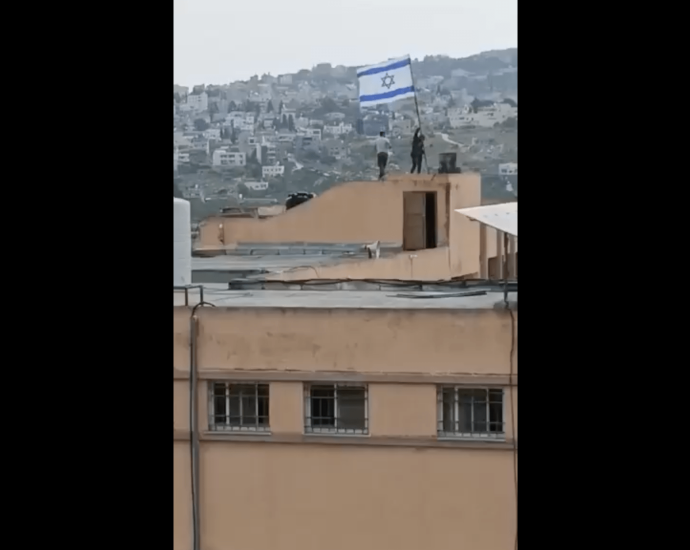 israeli-settlers-vandalise-school,-raise-israeli-flag-in-occupied-west-bank