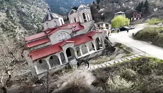 tourists-test-balance-inside-tilted-church-in-greece’s-ropoto