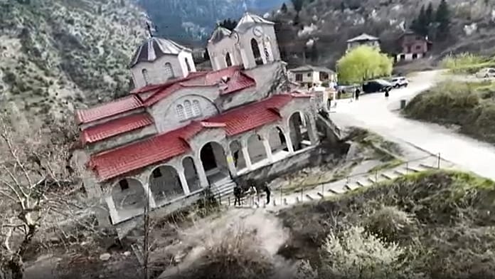 tourists-test-balance-inside-tilted-church-in-greece’s-ropoto