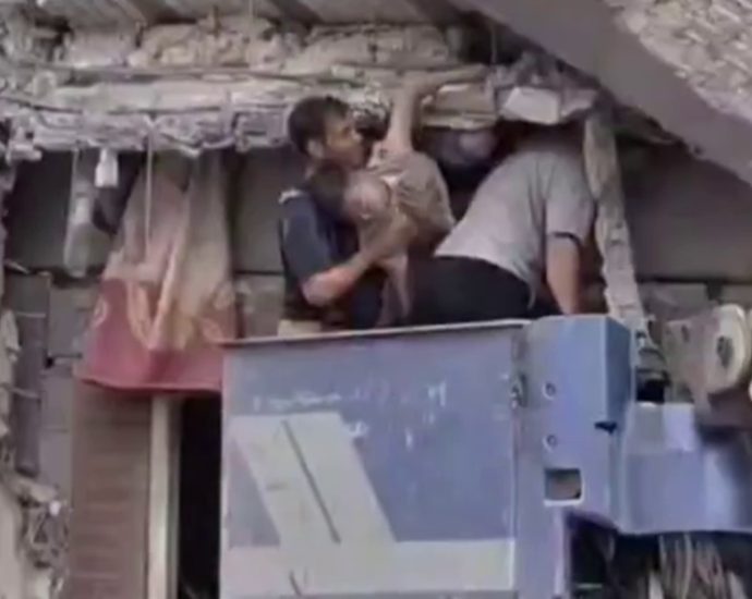 rescue-workers-rush-to-save-lives-after-south-tehran-missile-strike