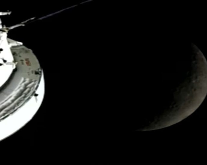 Artemis 2 astronauts fly around the moon in record-breaking lunar loop by NASA